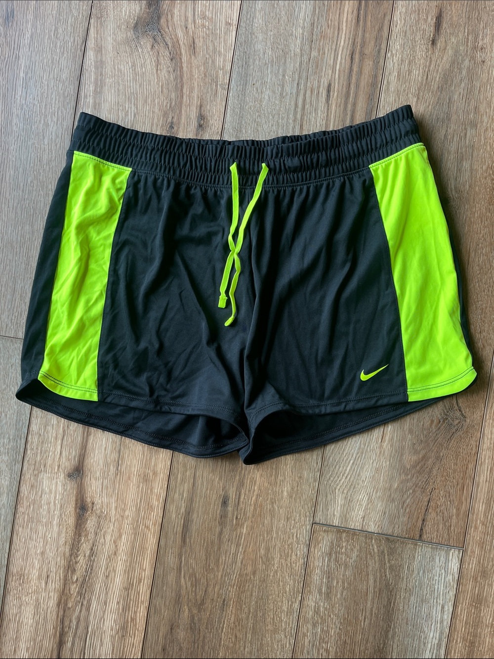 Nike Women's Black Athletic Shorts with Neon Yellow Panels